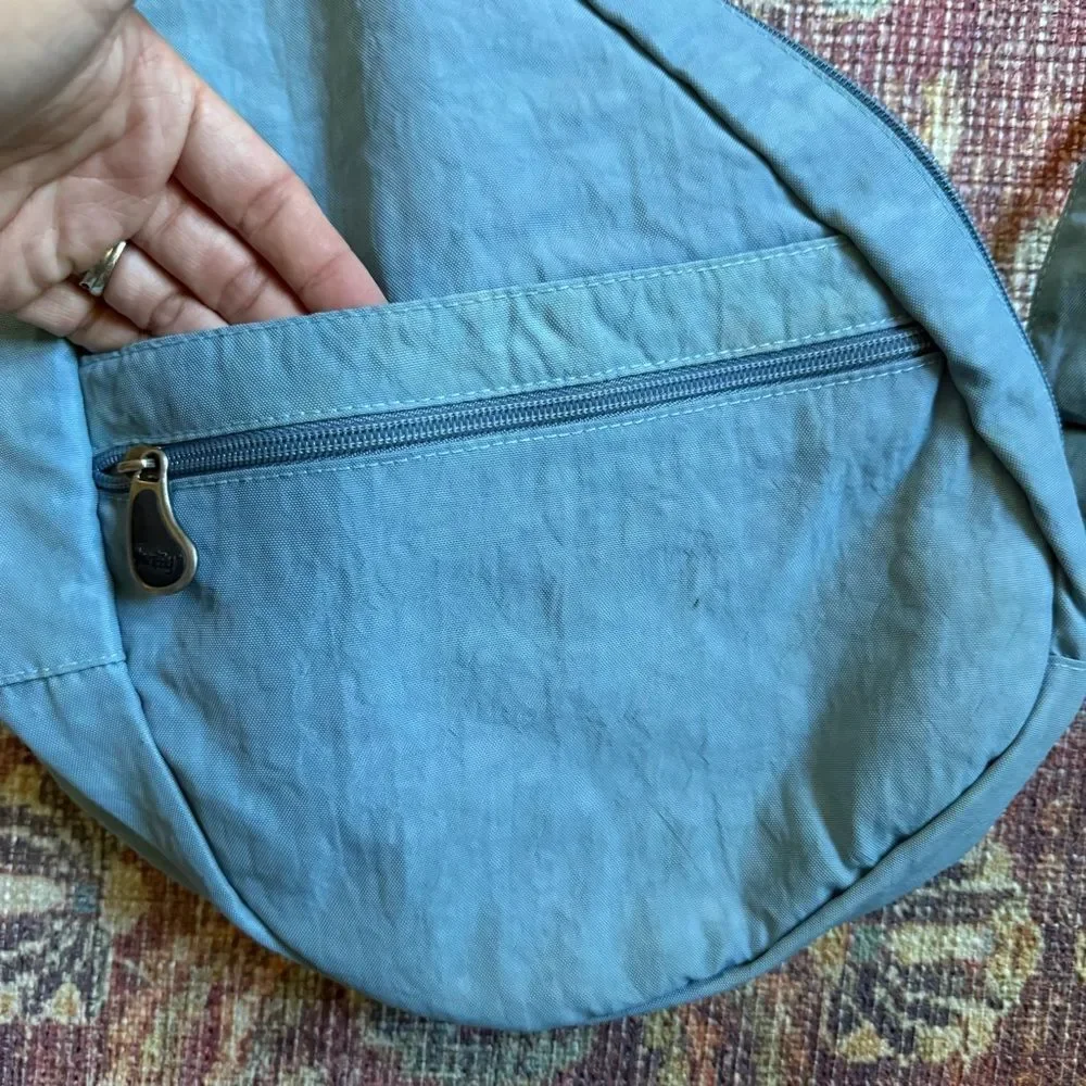 Ameribag light blue crossbody Sling Bag healthy backpack multi pocketed